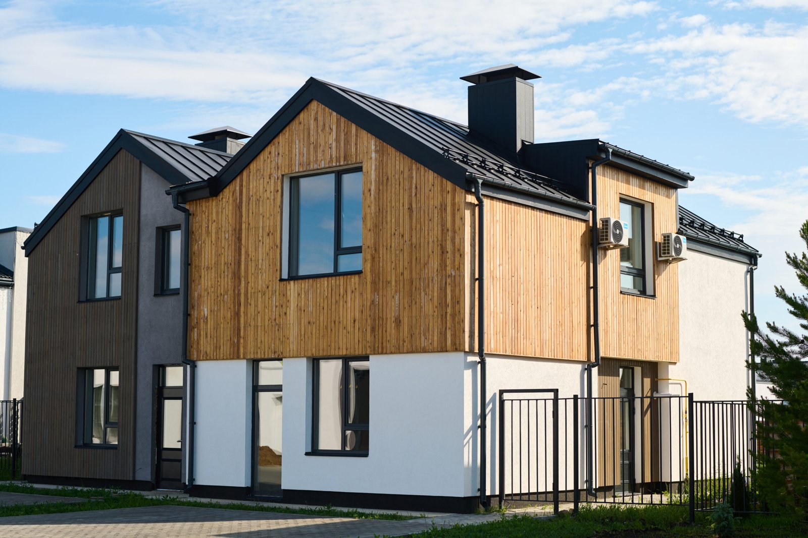 https://familysiding.com/wp-content/uploads/2024/04/i-underroof.com-cedar-two-small-cottages-of-pastel-colors-standing-next-2025-03-15-23-03-32-utc-scaled.jpg